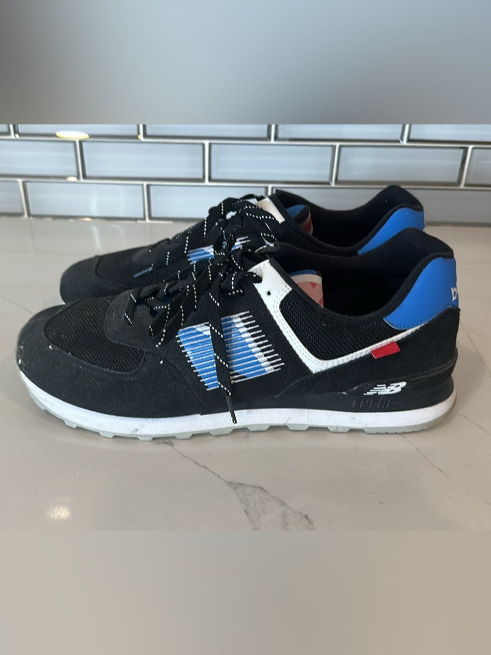 New Balance Black Sneakers with Blue and White Accents